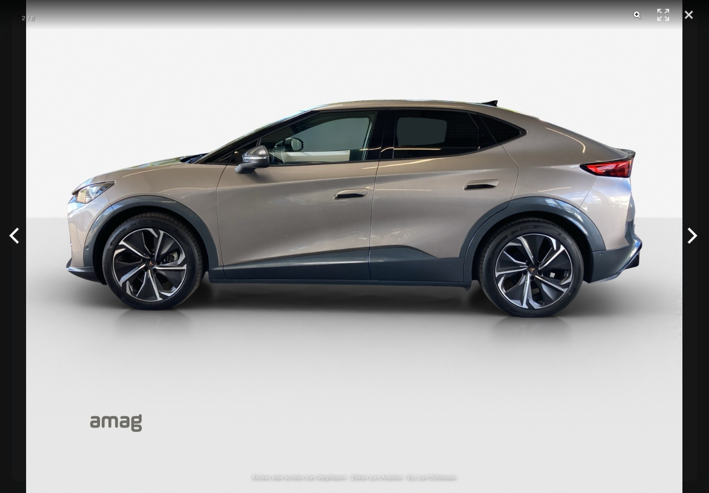 Full-screen car photo inspector showing the second of eight listing photos