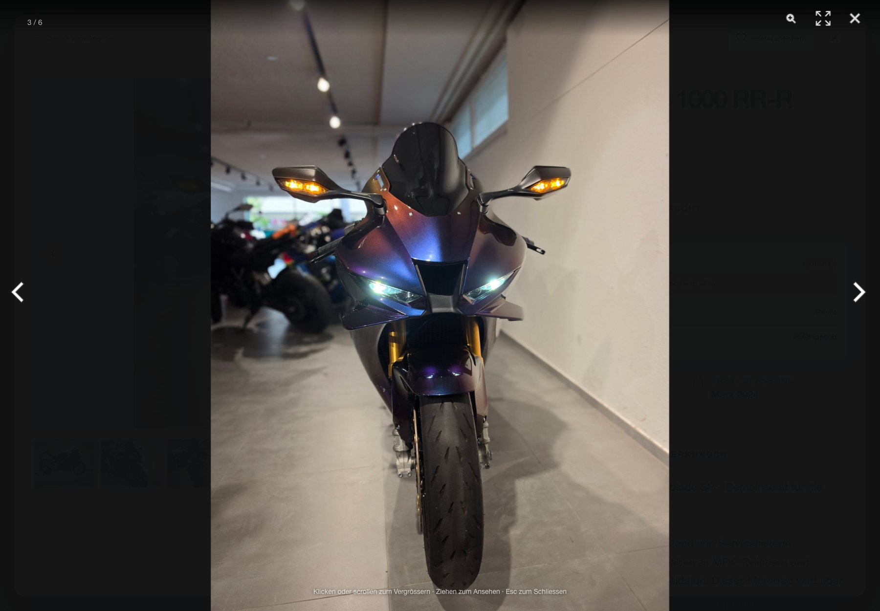 Full-screen motorcycle photo inspector showing the third of six listing photos